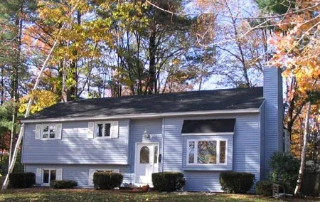 This split-foyer home received a new and improved exterior with new siding.