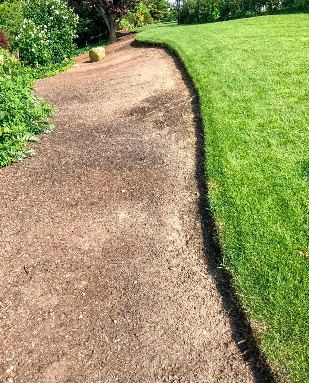 Professional base preparation for a landscaped walkway