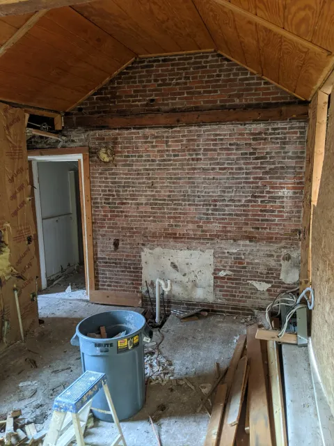 UNIT C KITCHEN WALL BEFORE.jpg