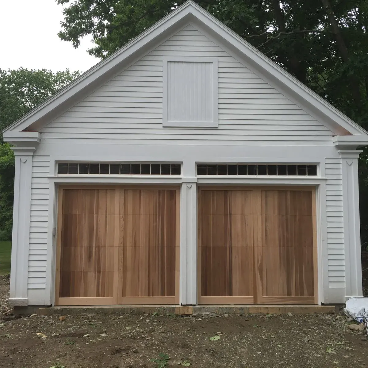 New garage with cedar carriage doors