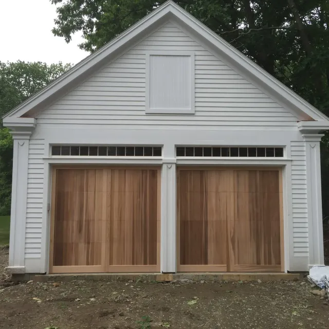 New garage with cedar carriage doors