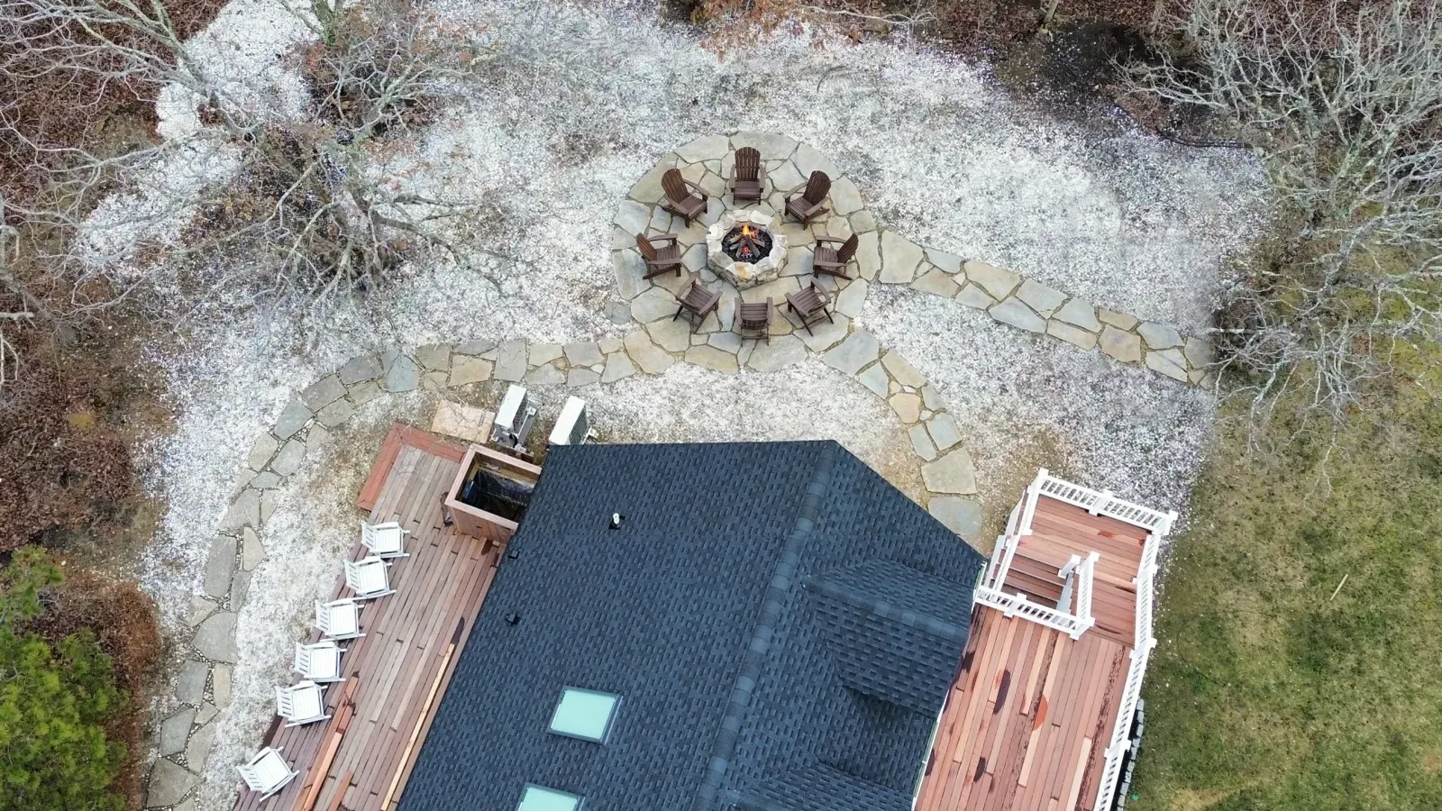 Finished fire pit area with curved planting border