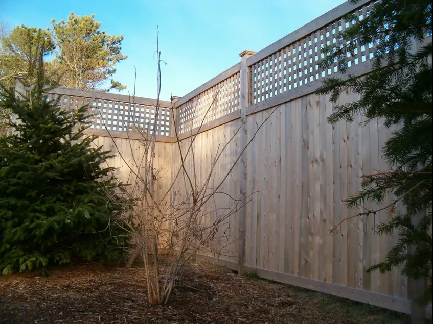 Lattice-top wood privacy fence