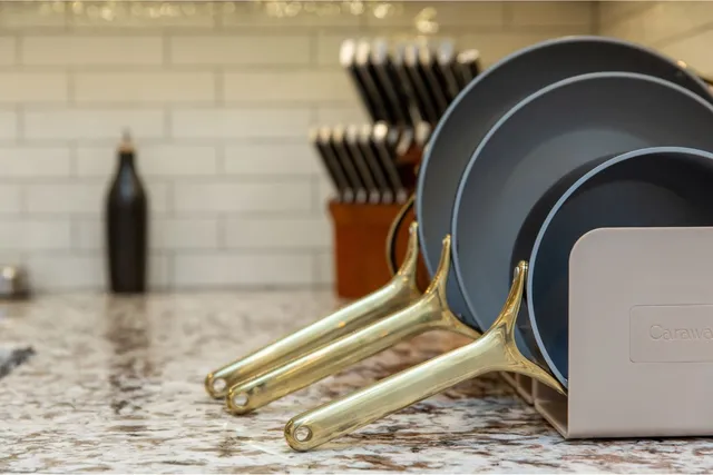 Frying pan and kitchen knife set on granite countertops in a kitchen remodel in Greenland, NH