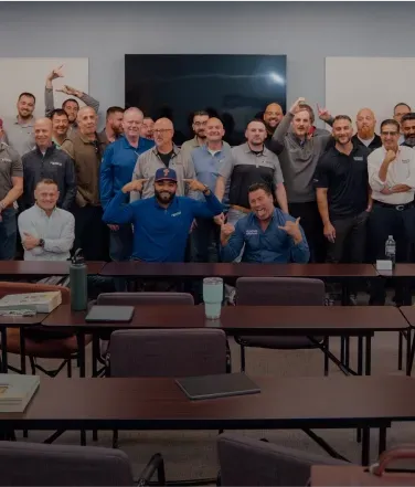 RBA employees standing with an award