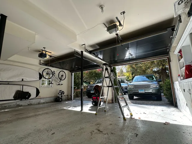 Garage door cable repair for double door.
