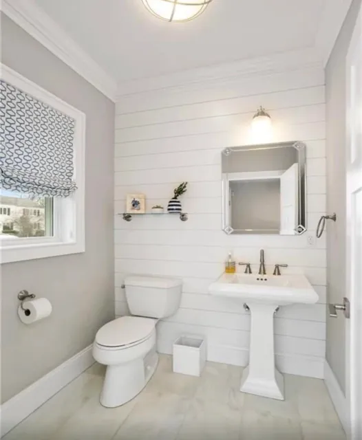 White Powder Room remodel with shiplap Bath Masters Fairfield County