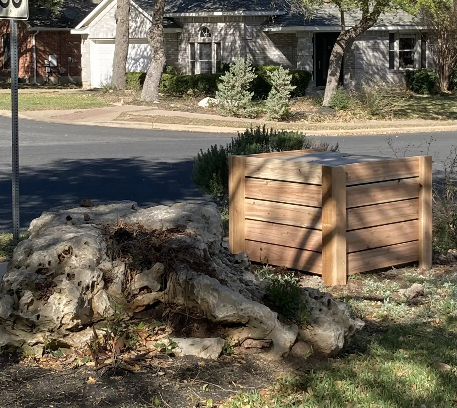 custom three-sided cedar enclosure to hide electrical box