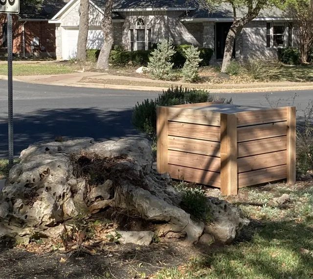 custom three-sided cedar enclosure to hide electrical box