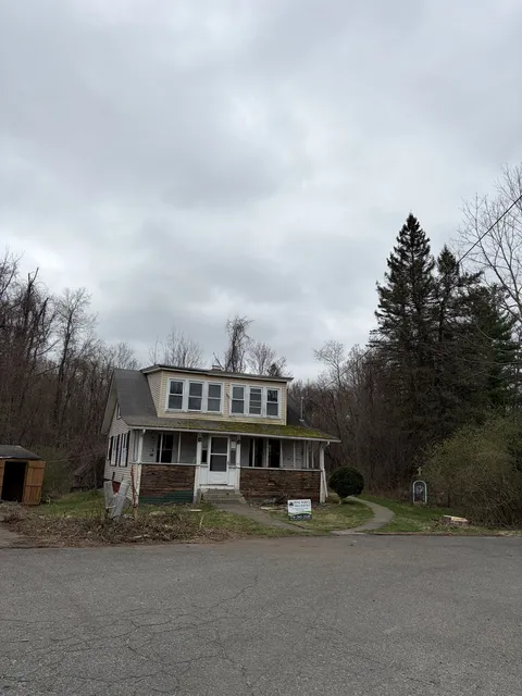 House visible after pines removed