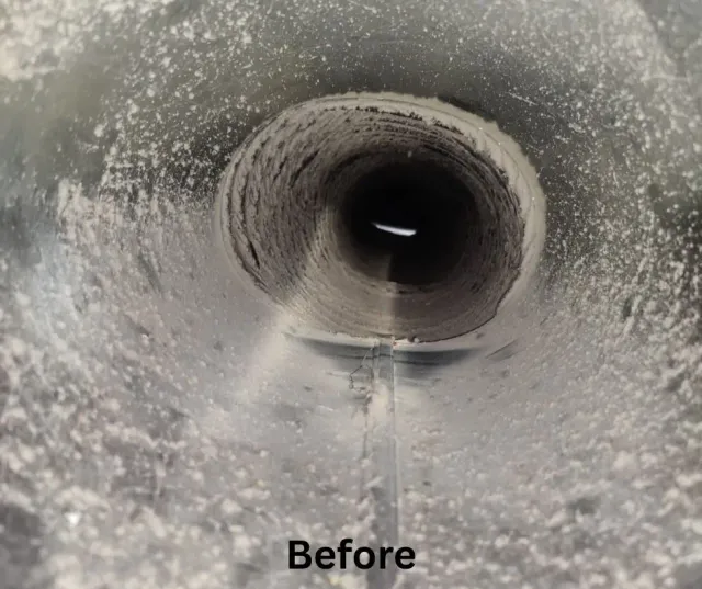 Interior of air duct showing heavy dust and debris before professional air duct cleaning Massachusetts by Clean Air Pro.