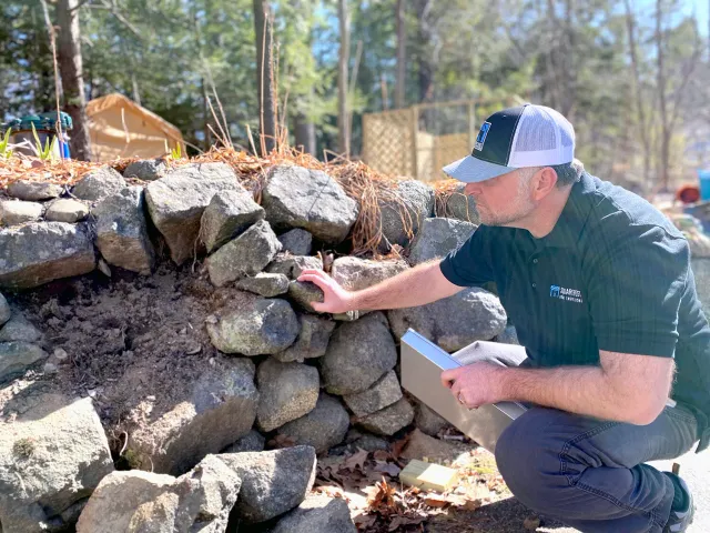 Inspection of exterior rock wall structure