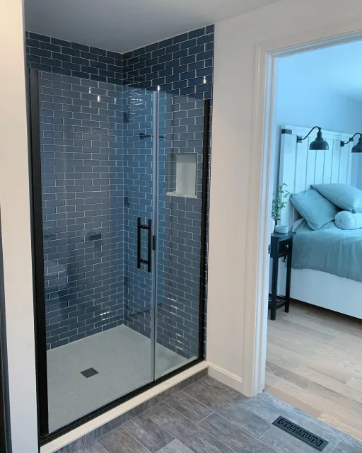 We LOVE how this bathroom came together as part of our #groton addition. The clients really wanted to add to the space and give the whole room a face lift&hellip;so we turned the laundry closet into a gorgeous glass-tiled shower stall and switched ov