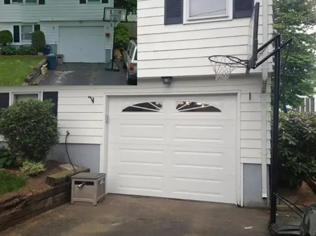 White garage door with glass panes above; basketball hoop nearby.