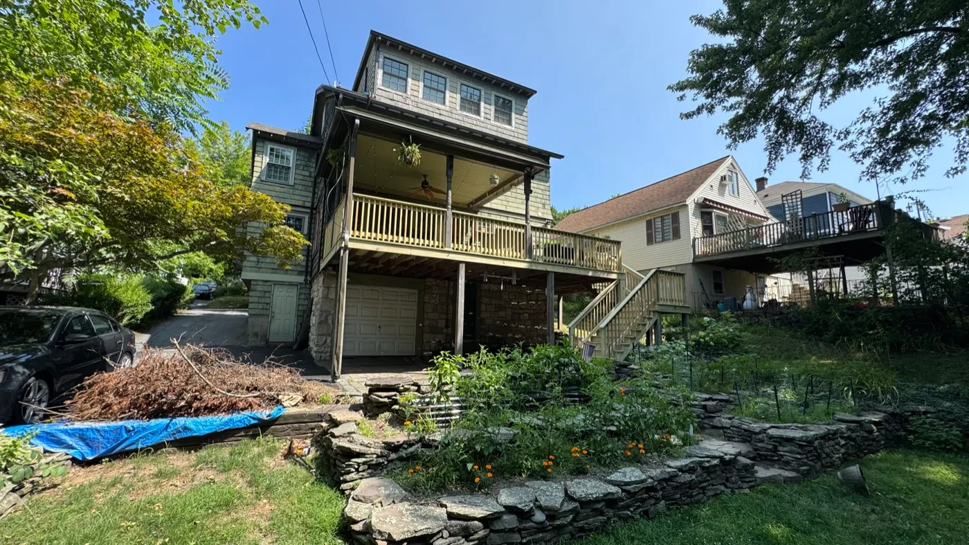 Second-story wood deck built above a garage
