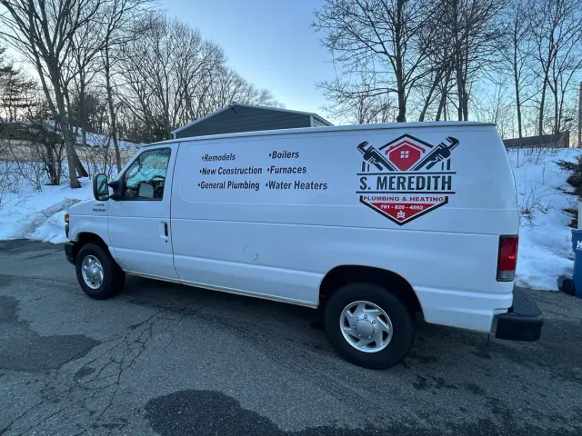 The S. Meredith Plumbing & Heating work van — fully stocked, owner-driven, serving the North Shore and Boston
