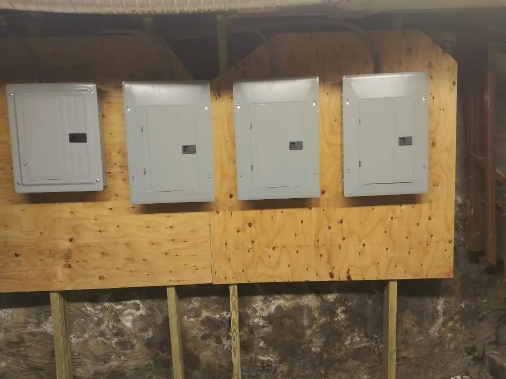 Bank of four sub-panels on a basement backer board