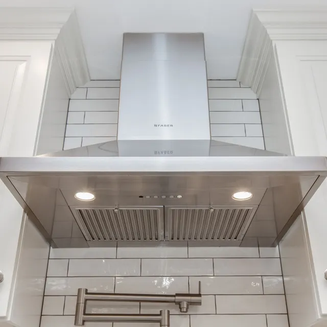 Faber Nova Pro stainless steel vent hood in a kitchen remodel in Portsmouth, NH