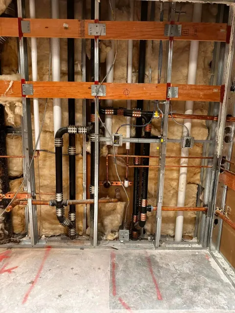 A room with a lot of pipes in it