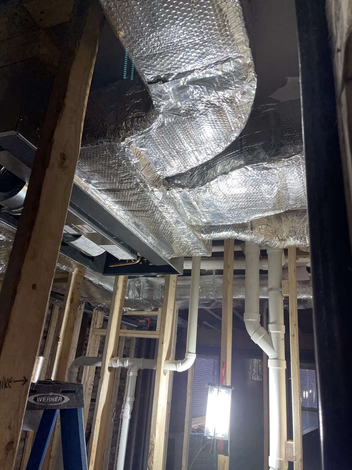 Ceiling air handler on a six-unit build