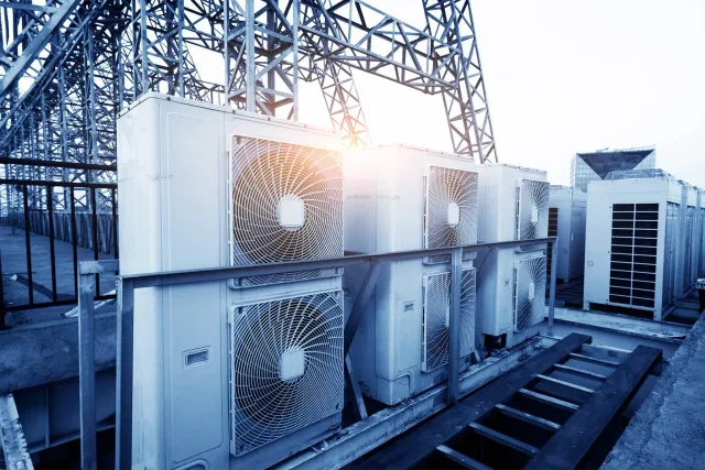 Air Conditioner Units on A Roof of Industrial Building — Malden, MA — Better Comfort Systems, Inc.