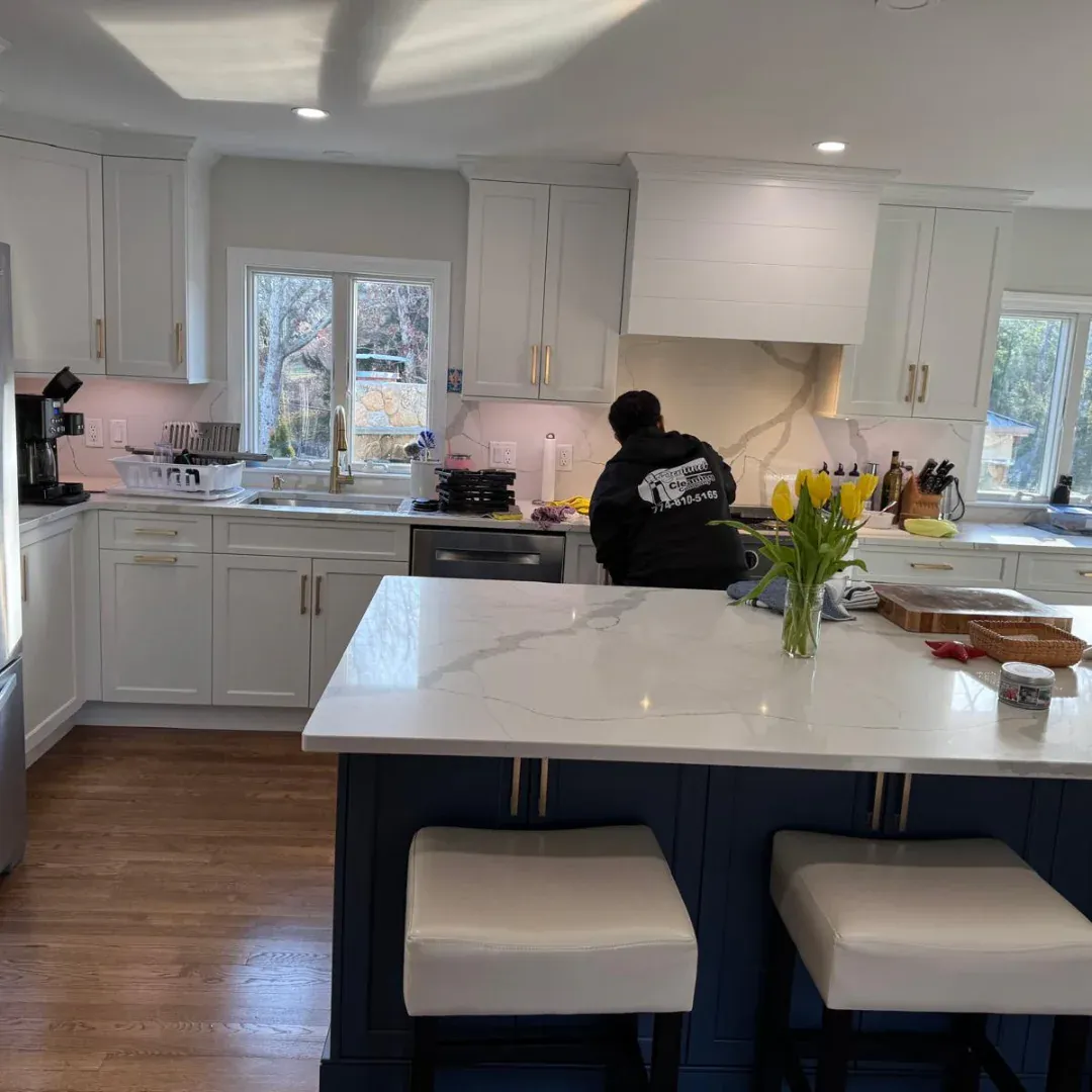 Sentinel Cleaning team deep cleaning a kitchen in Cape Cod