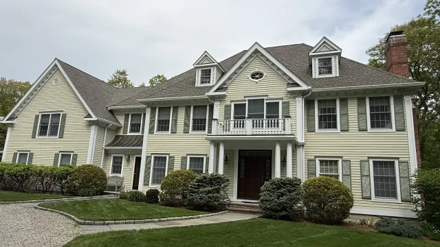 Roof replacement and new gutters on a home in Wilton, CT