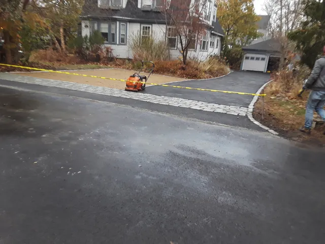 work photo from asphaltdrivewaysolutions.com