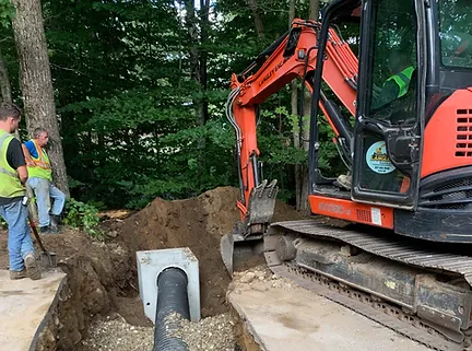 Excavator burying underground utility