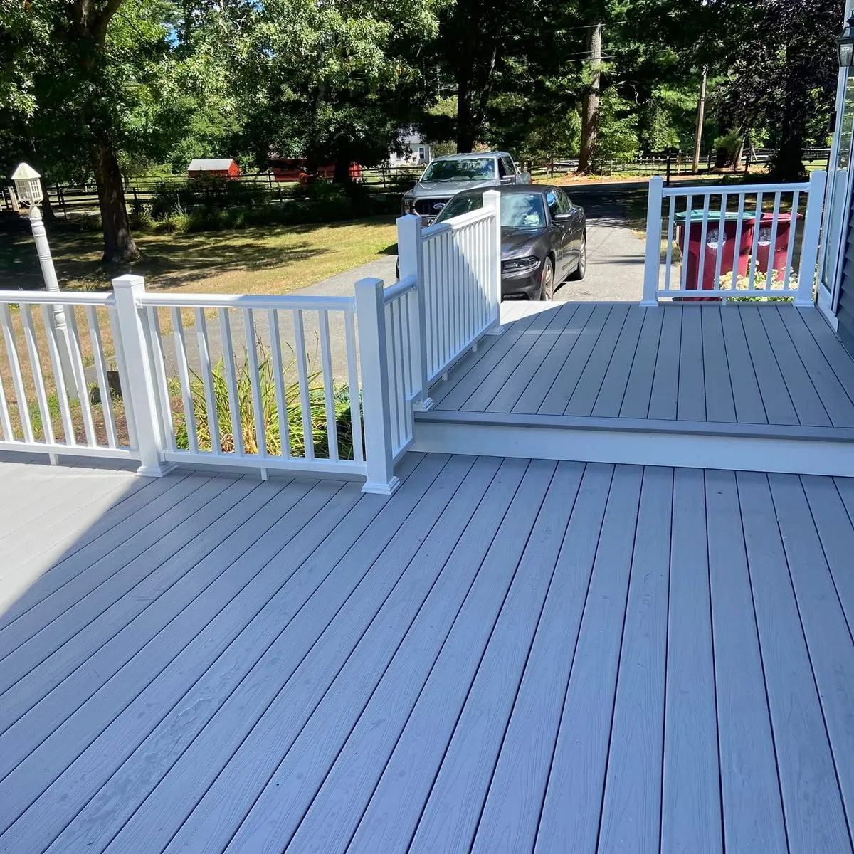 Composite deck with white vinyl railings
