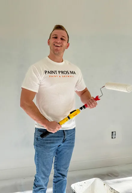 Paint Pros MA Employee Smiling on the job