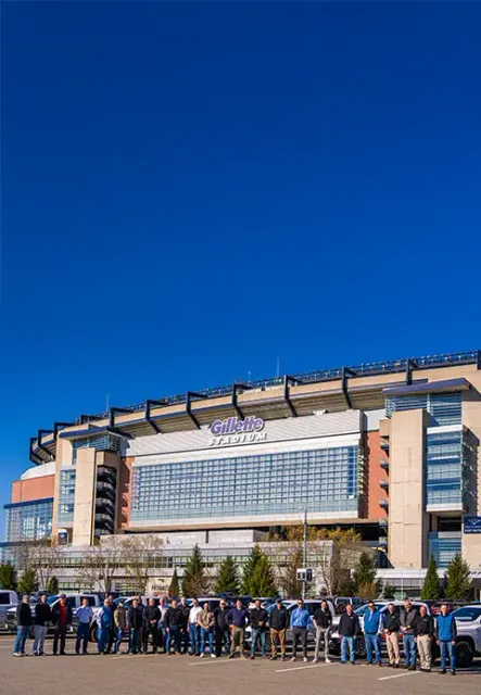 The Door Systems teams in front of the Gilette Stadium.
