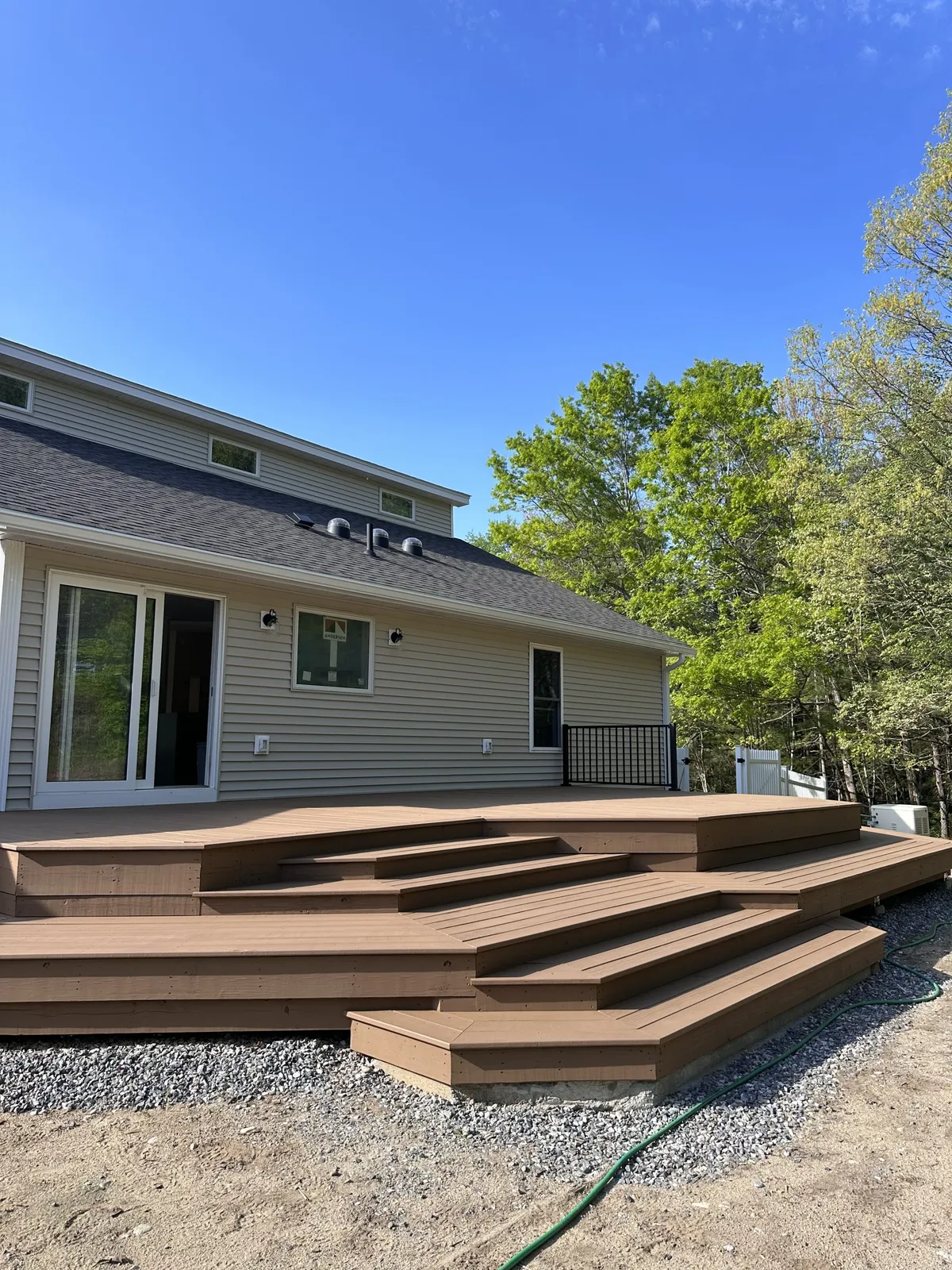 New deck installation with stairs by MS Remodeling Group - back patio (larger)
