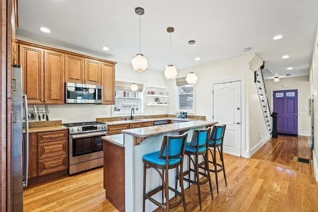 Kitchen range wall with custom cabinetry in Melrose, MA