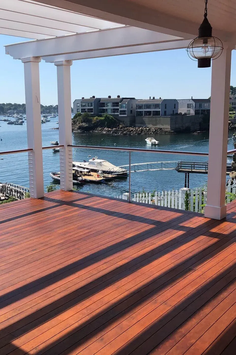 Wire handrail, mahogany, waterfront