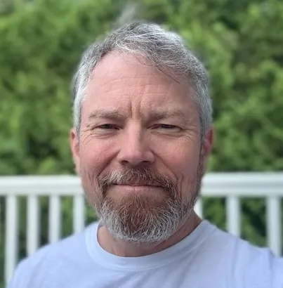 headshot of Austin