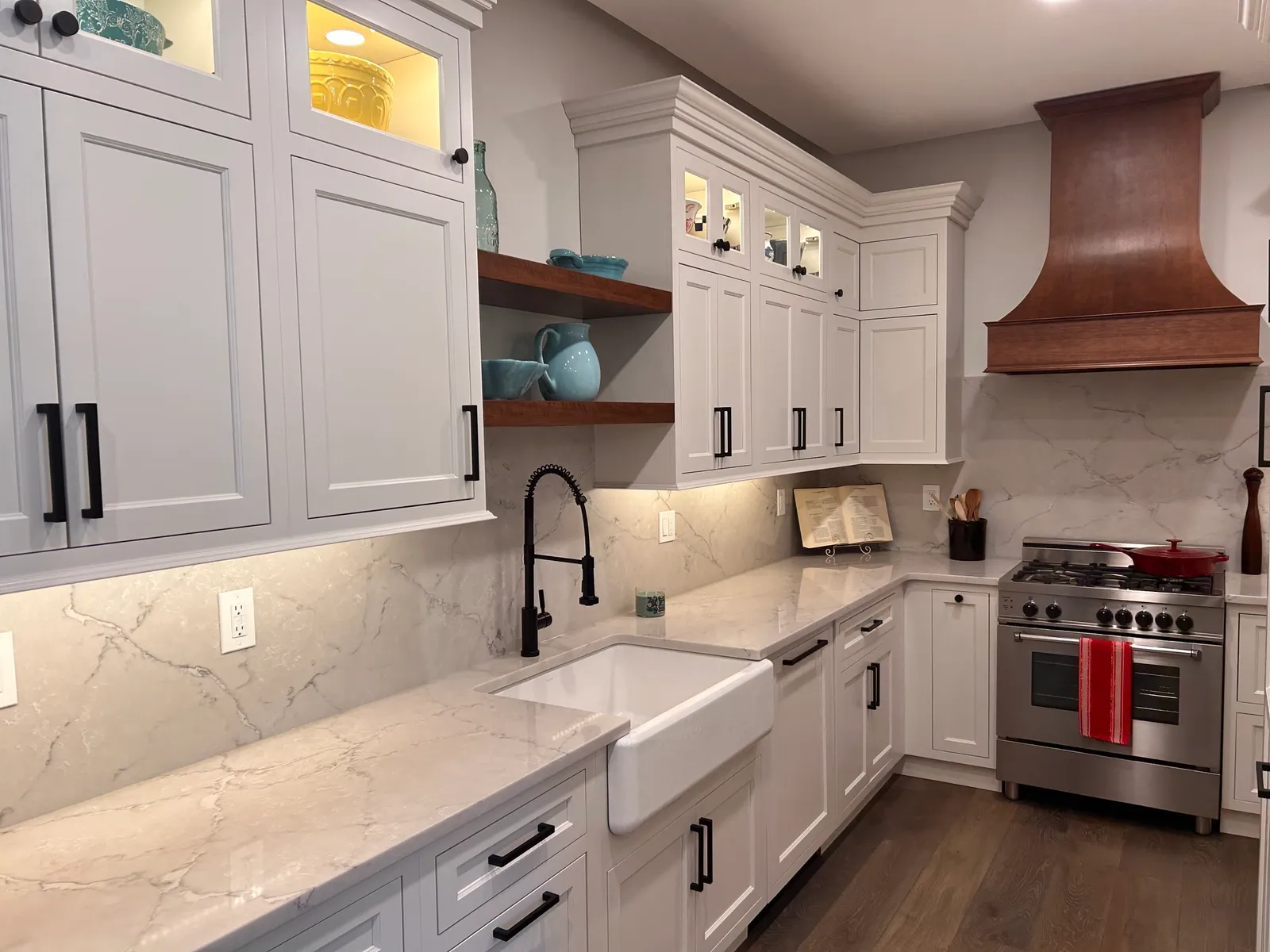 Apron-front sink, marble counter, stainless range