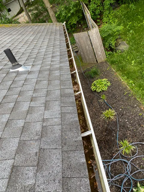 MBM Gutters cleaning services work photo