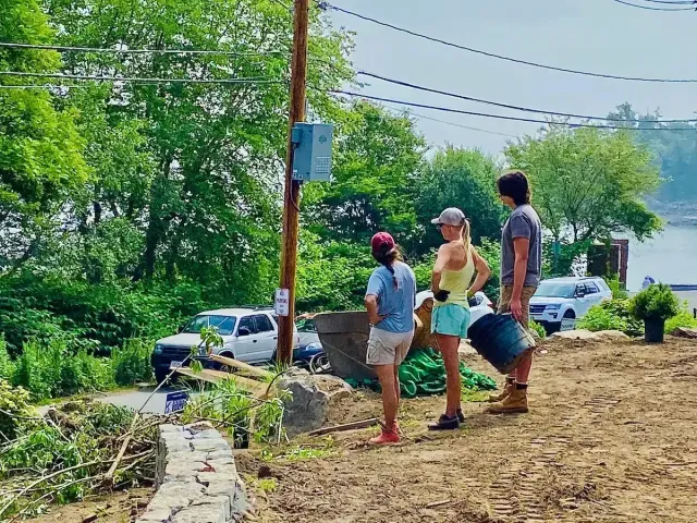 Garden maintenance services in Marblehead MA with professional landscape crew working on coastal property.