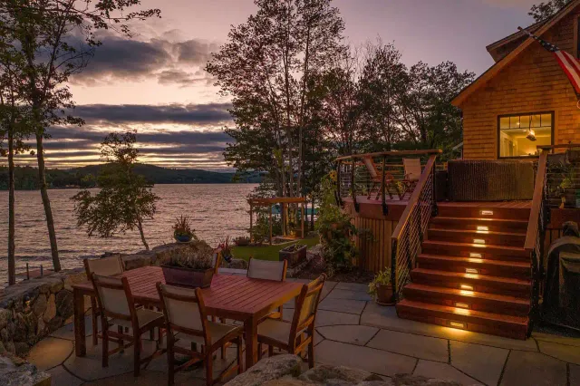 Lakefront home with deck step lighting installed by Atlantic Electrical Services in York County Maine