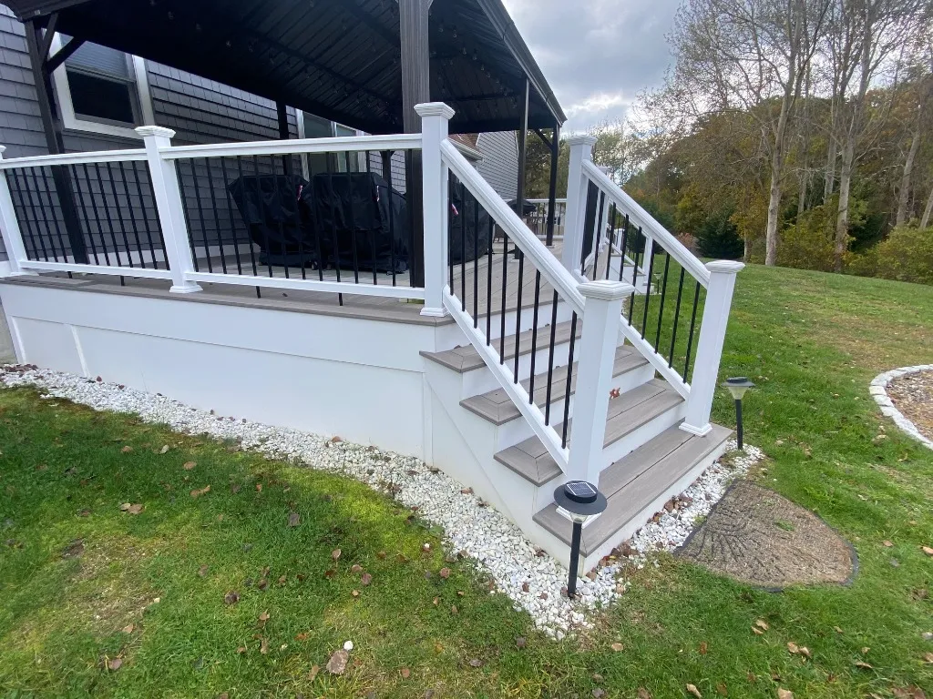 Composite back deck with custom railing and lighting