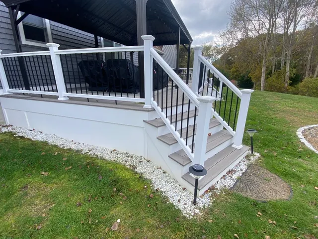 Composite back deck with custom railing and lighting