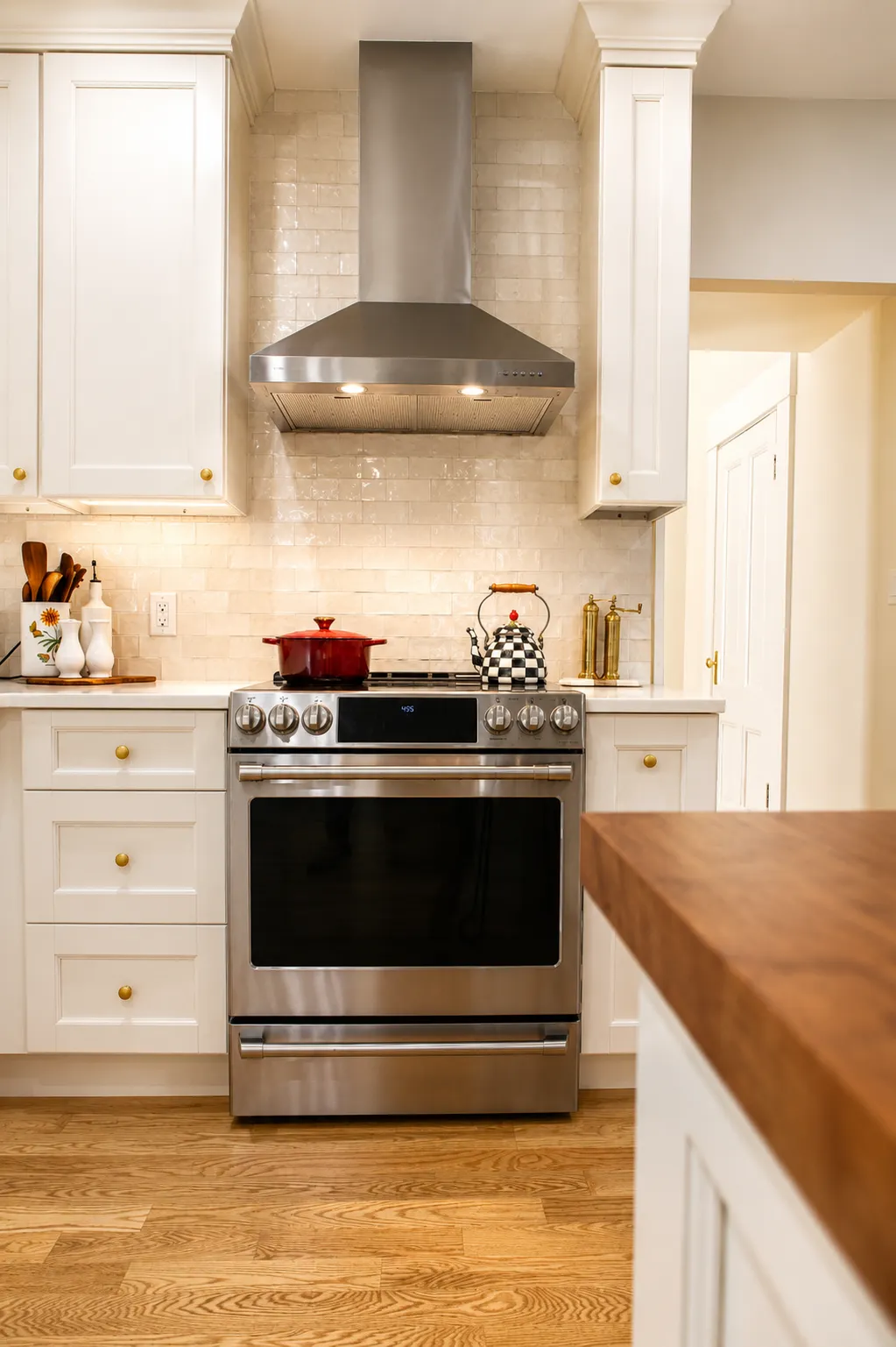 Cambridge kitchen remodel — range wall with chimney hood