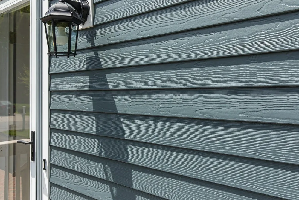close up of Evening Blue James Hardie siding in Acton