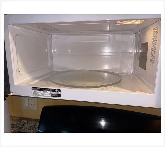 After: Microwave before and after cleaning