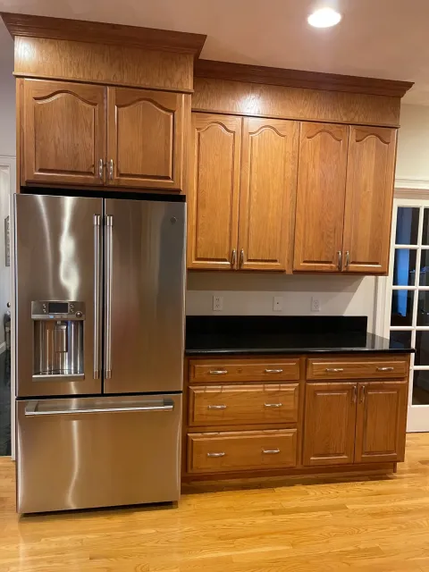 Before oak kitchen cabinet refacing in Wilmington MA