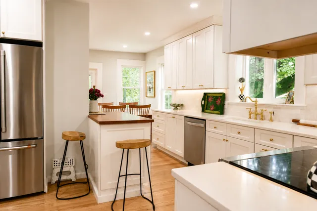 Cambridge kitchen remodel — butcher-block peninsula and dining area
