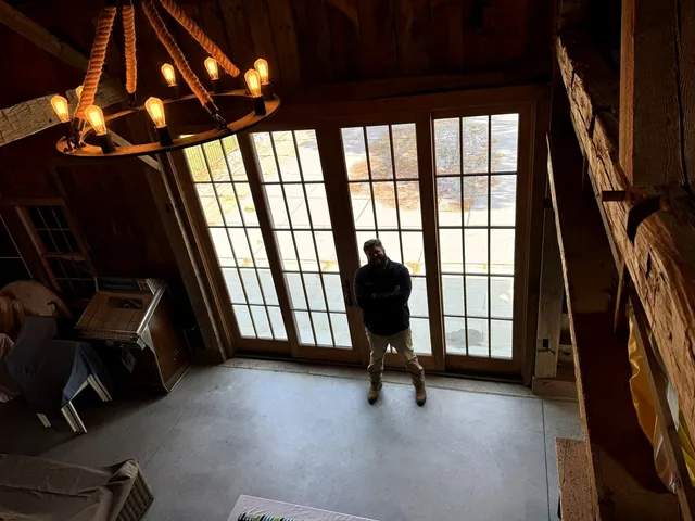 Post and beam structure with sliding glass door installation