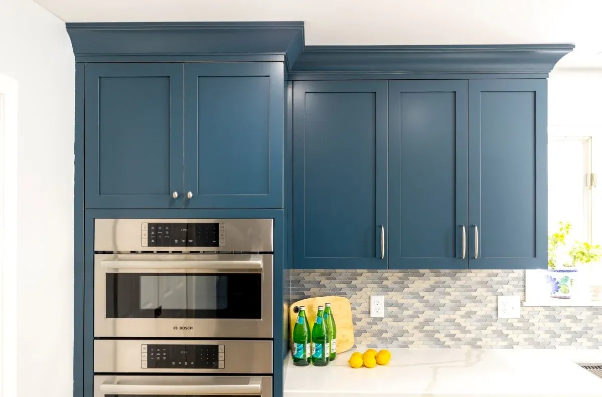 Cabinetry in color Gale Force from Tedd Wood Fine Cabinetry.