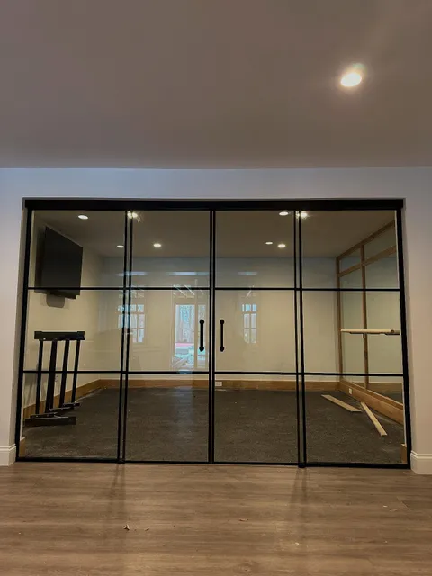 Beautiful craftsmanship on this soft close gym entryway. Shout out to #HMIGLASS for the assist in this gridscape system. #entryway #gridsystem #HMI #glass